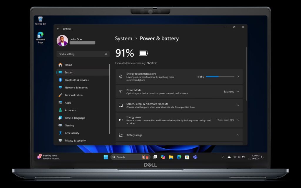 Laptop screen displaying system settings with a focus on power and battery options, showing 91% battery and estimated time remaining.