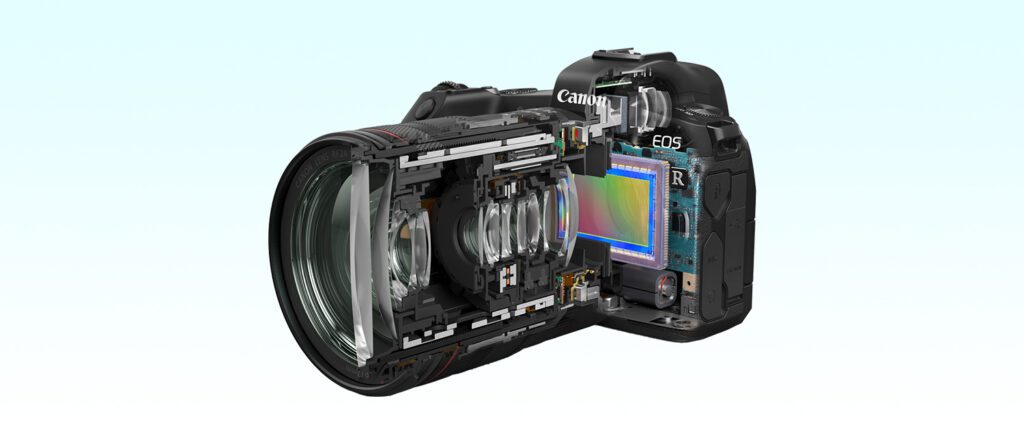 Cutaway view of a Canon EOS camera showcasing internal components, including the lens, image sensor, and electronic circuitry.