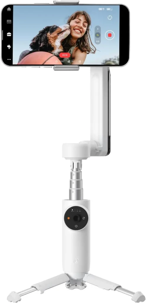 A smartphone mounted on a tripod captures a playful moment with a dog, showcasing a video recording interface with controls.