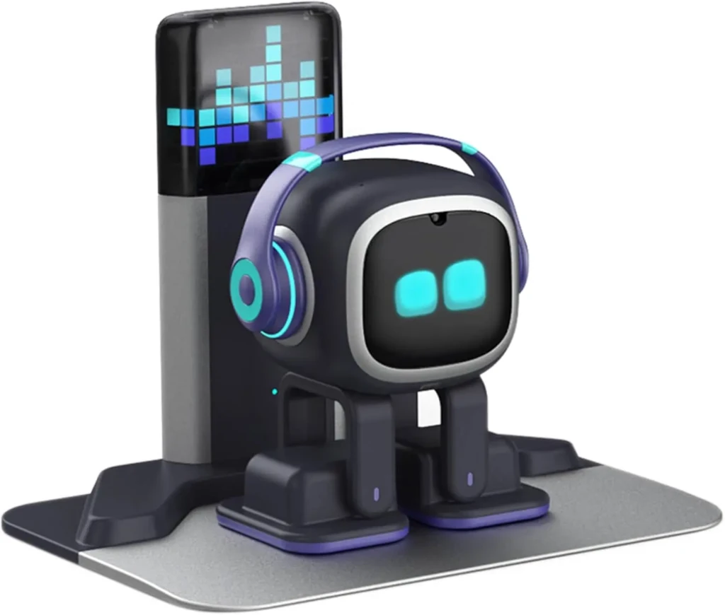 A small robot with headphones stands on a sleek base, featuring a digital display with soundwave graphics.