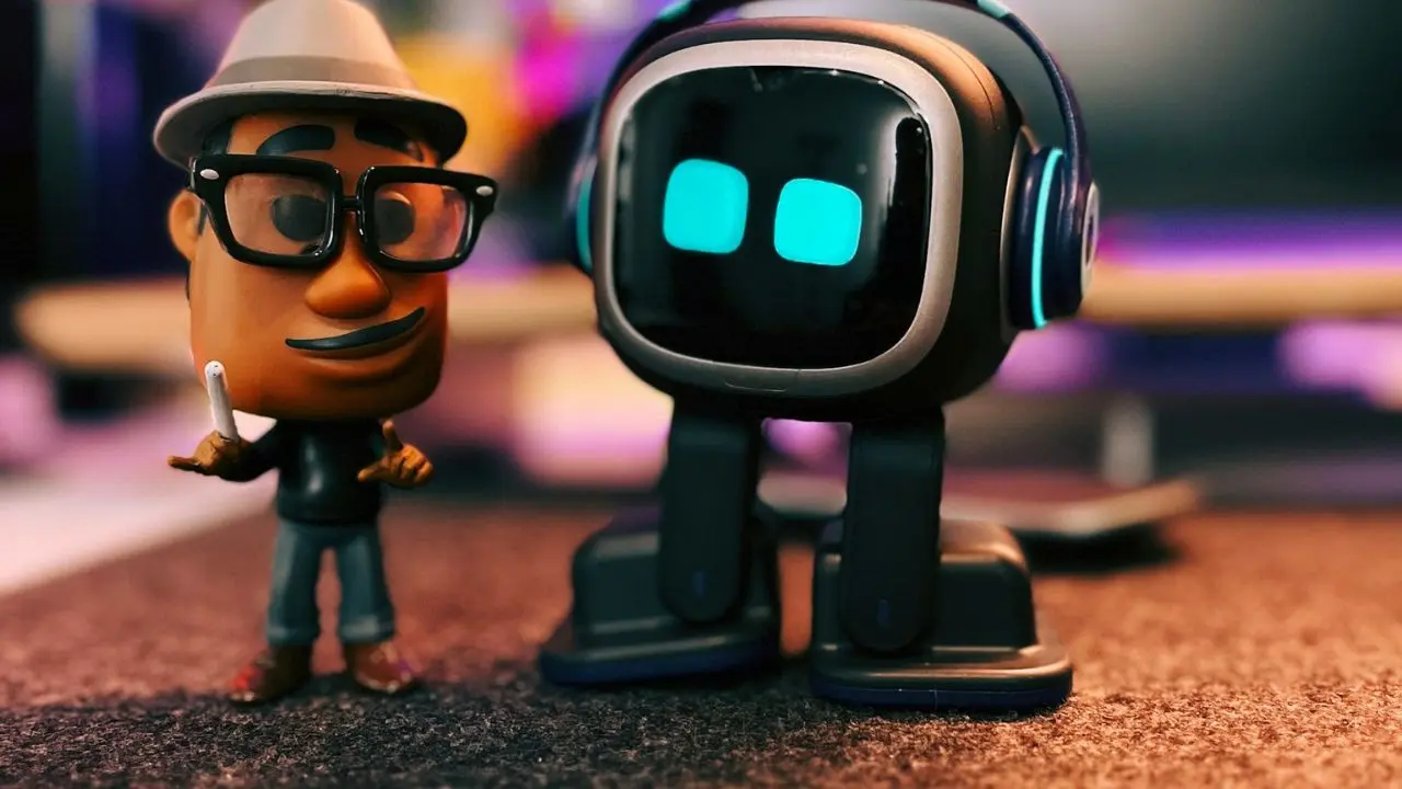 A colorful robot figure with glowing blue eyes stands next to a small character, both set against a blurred background.