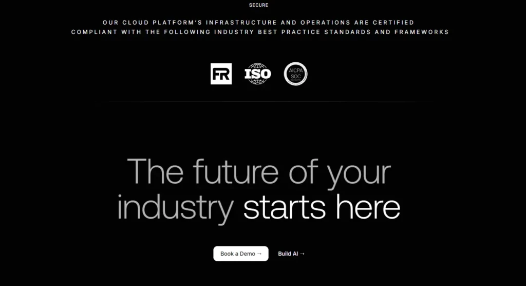 A black background promotional banner stating “Our cloud platform’s infrastructure and operations are certified compliant with the following industry best practice standards and frameworks,” displaying FR, ISO, and AICPA SOC logos, followed by the tagline “The future of your industry starts here” and buttons for “Book a Demo” and “Build AI.”