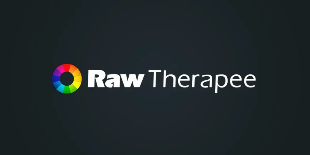 The Raw Therapee logo featuring a multicolored circular color wheel icon beside the word “Raw Therapee” in white text, set against a dark background, representing its powerful, open-source RAW photo processing software for photographers seeking advanced editing control.