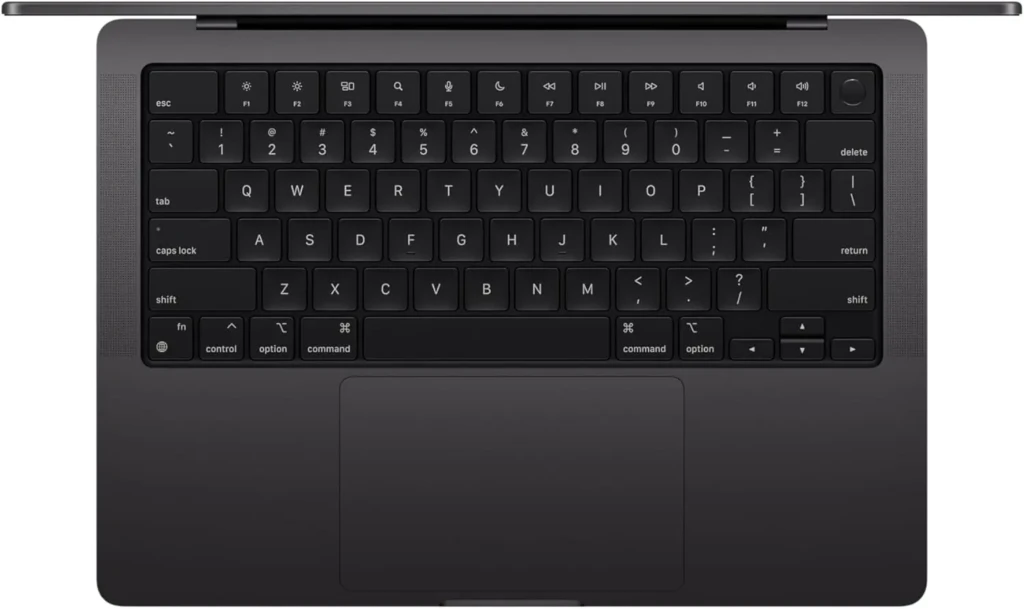 A top-down close-up of the MacBook Pro’s keyboard and trackpad, featuring black keys with white legends, function row, Touch ID sensor, and the iconic command/option/control layout, highlighting ergonomics, precision engineering, and macOS-specific key functionality.
