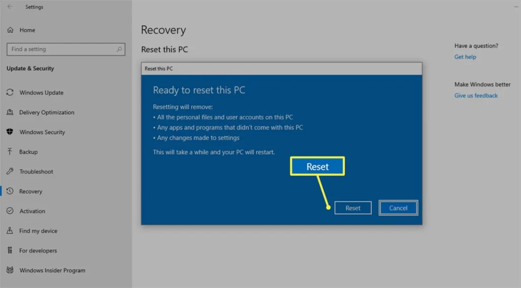 The Windows Recovery interface in Settings > Update & Security > Recovery, displaying the “Reset this PC” dialog with options to remove personal files, apps, and settings; the “Reset” button is highlighted in yellow, guiding users through the factory reset process.