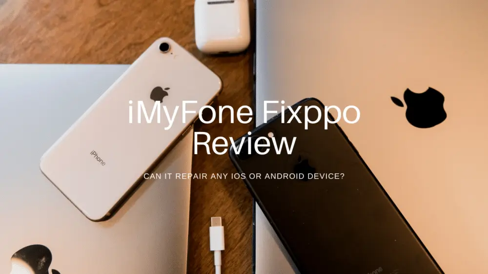 A lifestyle-style promotional image titled “iMyFone Fixppo Review” with the question “CAN IT REPAIR ANY IOS OR ANDROID DEVICE?”, featuring a white iPhone, black iPhone, AirPods case, USB-C cable, and MacBook on a wooden surface, illustrating the tool’s cross-device compatibility in a real-world setup.