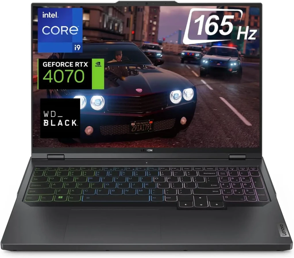 A black Lenovo Legion laptop showcasing key specs via on-screen overlays: Intel Core i9, GeForce RTX 4070, WD_BLACK storage, and 165 Hz refresh rate, with a high-speed car chase scene on the screen and RGB-backlit keyboard, highlighting premium hardware and performance for AAA gaming.