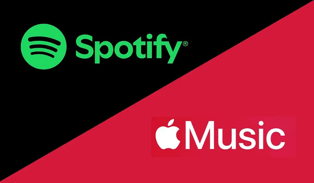 A split-diagonal graphic with the green Spotify logo and text on a black background (top-left) and the white Apple Music logo and text on a red background (bottom-right), visually framing a direct brand comparison between the two music streaming services.