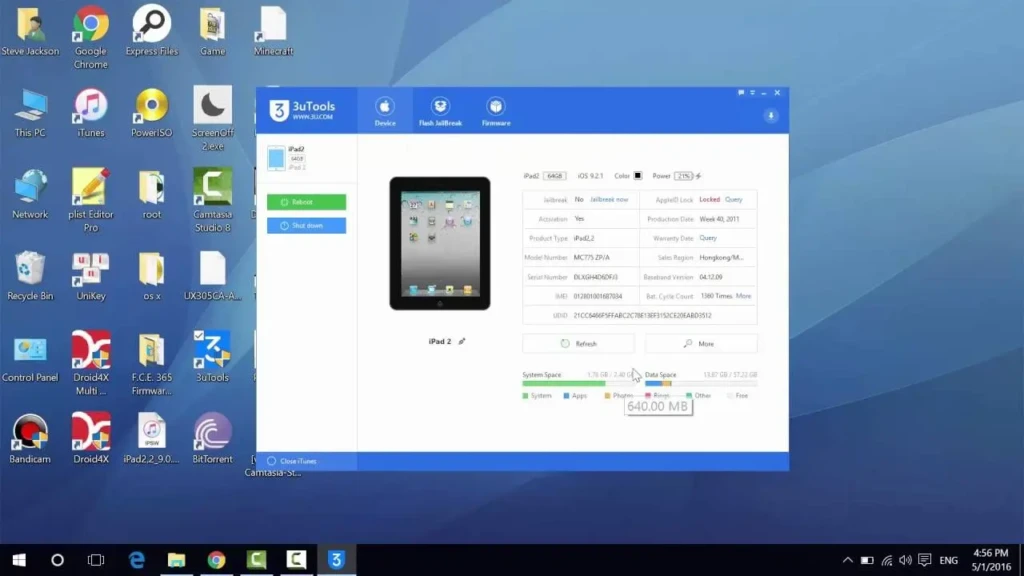 A Windows desktop with 3uTools open, showing iPad 2 diagnostics (iOS 9.2.1, 64GB, 21% battery), device details (model, serial, UDID), and storage breakdown; the background reveals a cluttered desktop with icons for iTunes, Minecraft, and other tools, depicting real-world usage of 3uTools for legacy iOS device support and system analysis.