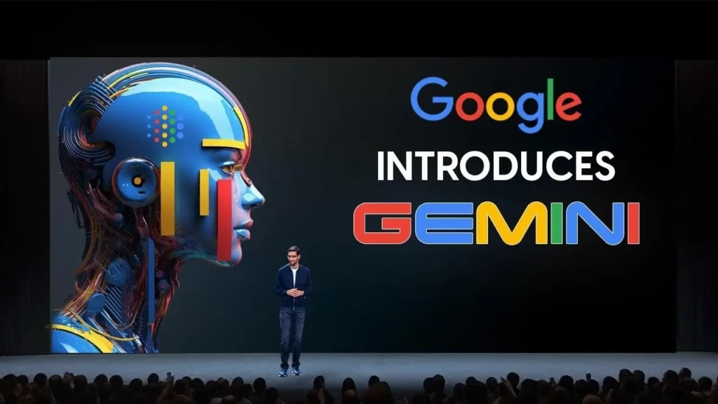 A stage presentation where a speaker stands before a large screen displaying “Google INTRODUCES GEMINI” in colorful lettering, alongside a stylized AI head illustration with circuitry and neural motifs, capturing the official launch event of Google’s Gemini AI model.