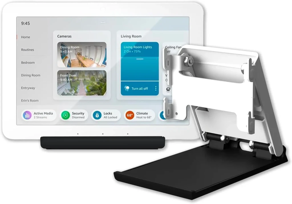 A white smart home hub tablet displaying a dashboard with live camera feeds (Dining Room, Front Door), room controls (Living Room Lights, Ceiling Fan), and status badges (Security Disarmed, Climate 68°), mounted on a white adjustable stand beside a black soundbar, illustrating centralized home automation and multi-room monitoring.