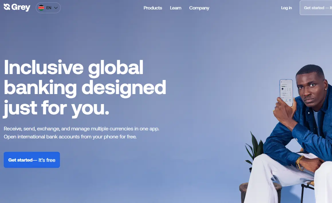 A man in a blue shirt and white pants holds a smartphone, sitting against a light blue background. The text reads 'Inclusive global banking designed just for you.' Keywords like products, learn, company, and login options are present, conveying a professional and inclusive tone.