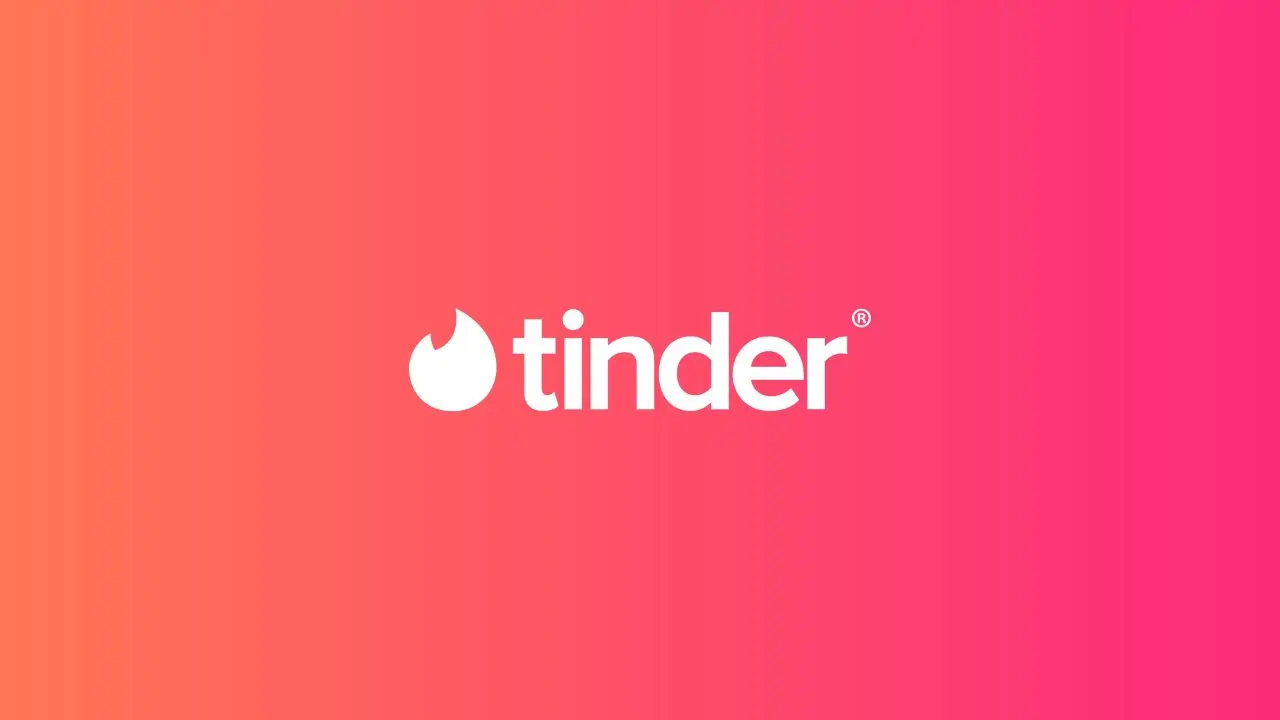 A white Tinder logo with a flame icon is centered on a vibrant gradient background, transitioning from orange to pink, conveying energy and warmth.