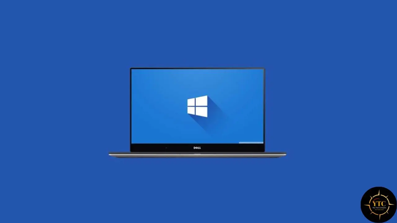 Dell laptop displaying the Windows logo on a blue background.