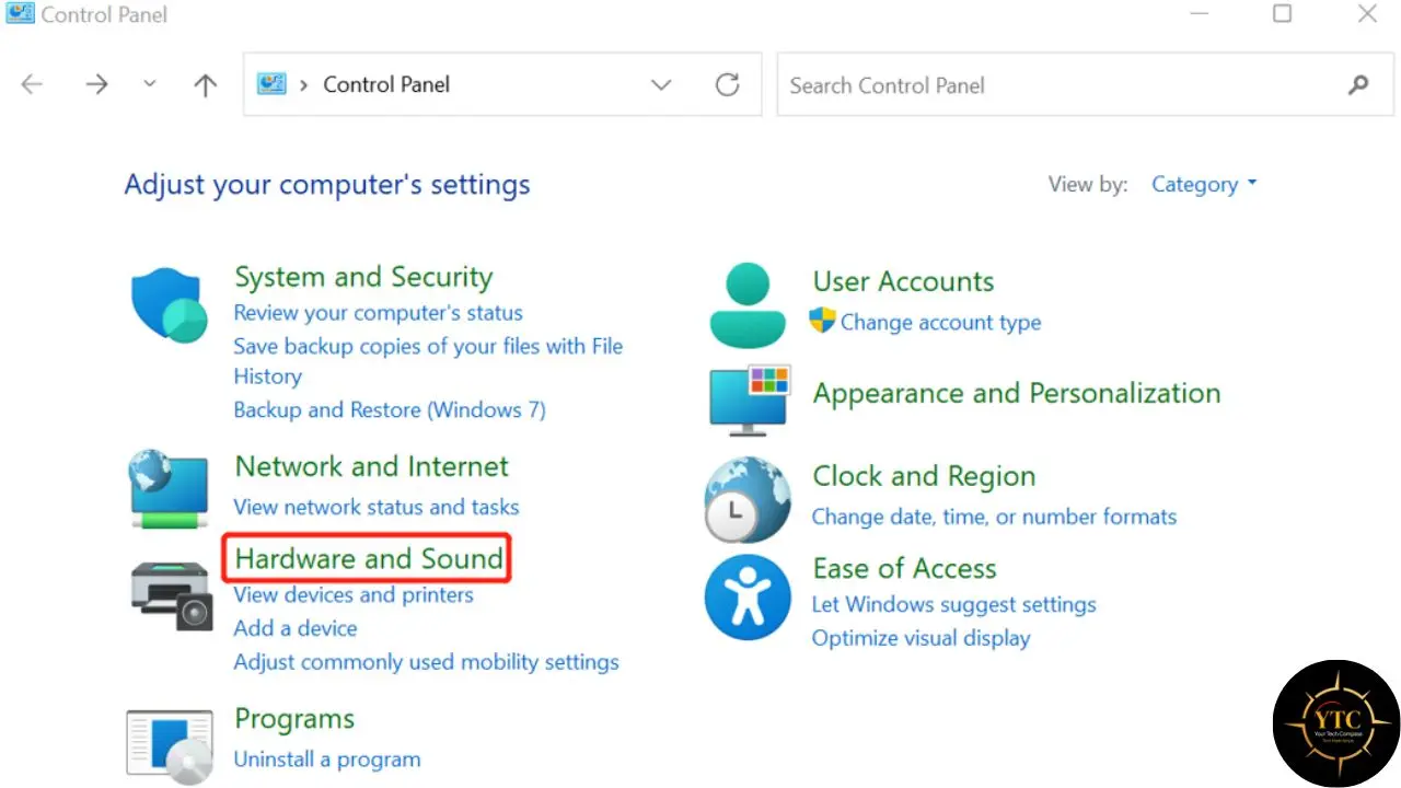 Windows Control Panel showing options for adjusting computer settings, with "Hardware and Sound" highlighted.