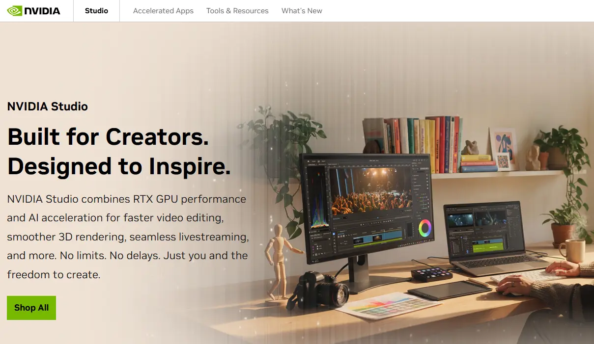 NVIDIA Studio website showing a desktop setup with a large monitor displaying video editing software, a laptop, and creative tools on a desk.
