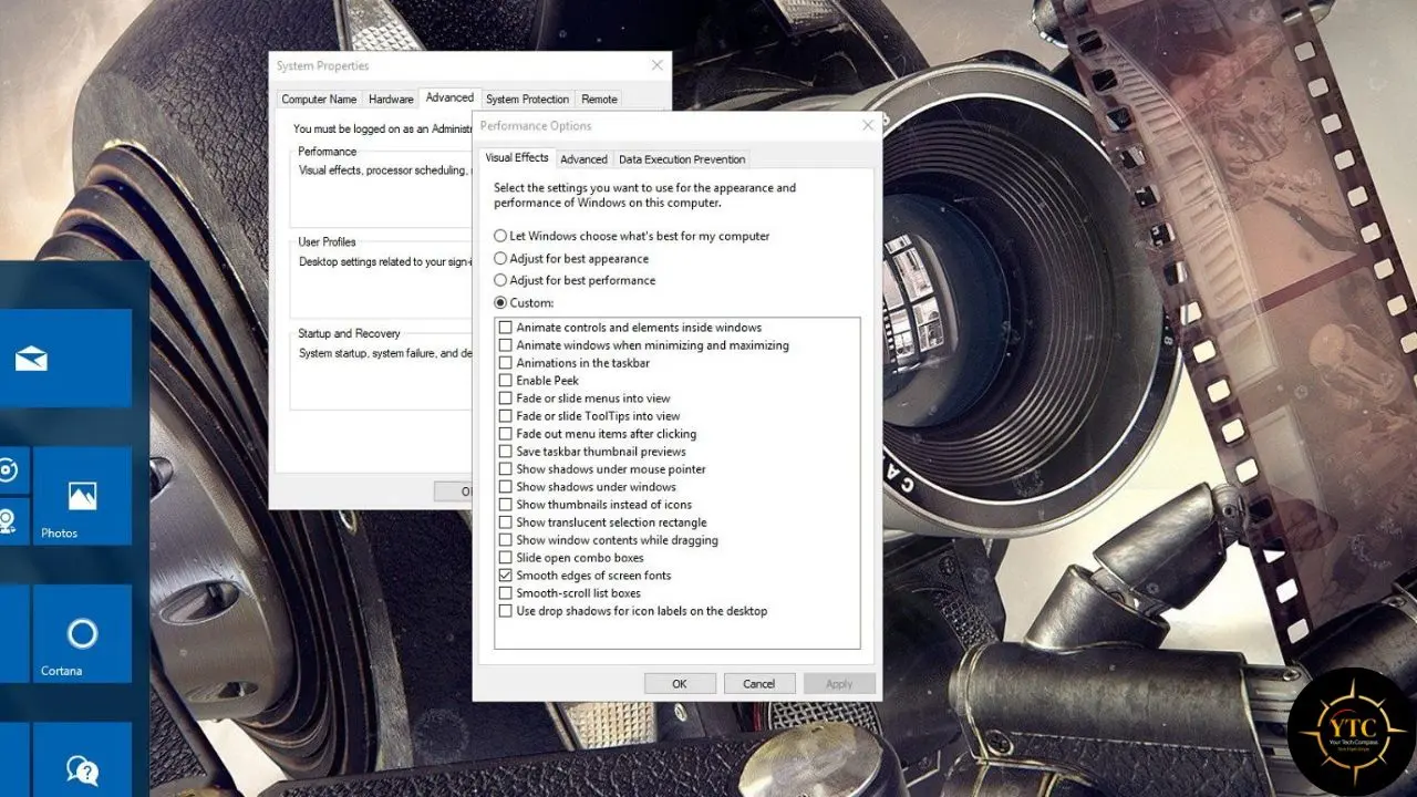 A Windows 10 Performance Options window is displayed over a vintage camera with film.
