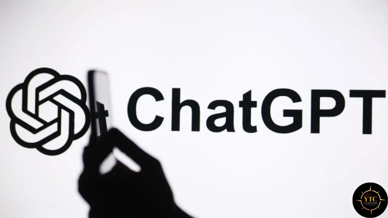 Silhouette of a hand holding a smartphone with the ChatGPT logo and text displayed on a white background.