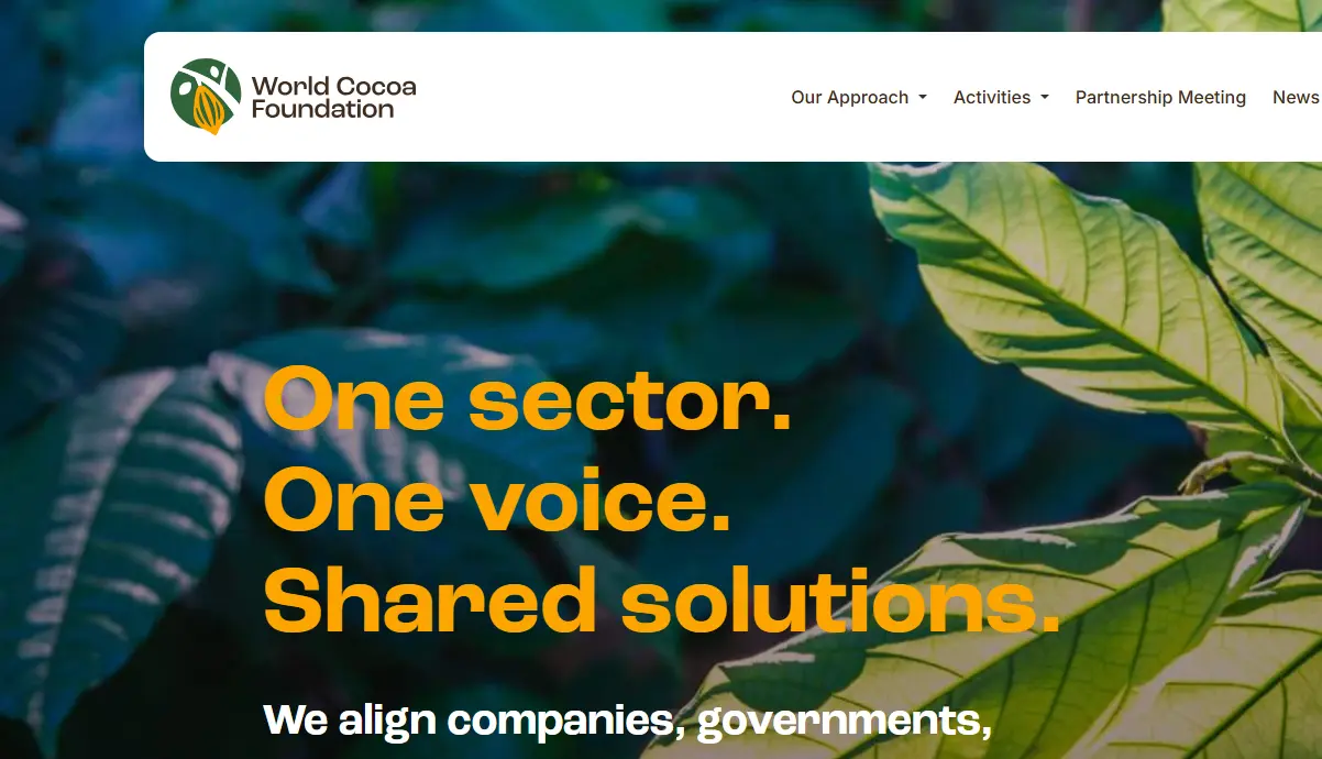 World Cocoa Foundation logo and tagline "One sector. One voice. Shared solutions." overlaid on a background of cocoa leaves.